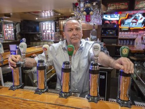 Ziggy Eichenbaum, owner of Ziggy's Pub, is seen in his bar Friday, June 12, 2020 in Montreal. As Quebec allows the reopening of restaurants that serve alcohol in the next two weeks bars without food are to remain closed.