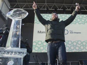 Laurent Duvernay-Tardif of the Kansas City Chiefs celebrates the team's Super Bowl win with adoring fans at Parc Jean-Drapeau in Montreal on Sunday, February 9, 2020.