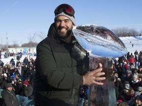 Laurent Duvernay-Tardif of the Kansas City Chiefs celebrates the team's Super Bowl win with adoring fans at Parc Jean-Drapeau in Montreal on Feb. 9, 2020.