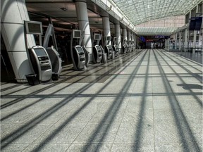 Luis Navarro walks through an empty Montréal-Pierre Elliott International Airport in Montreal Thursday May 7, 2020 on his way home to Mexico.