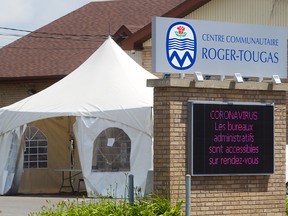 A mobile COVID-19 testing centre is seen in Mercier on July 8 after a COVID-19 outbreak connected to a house party there.