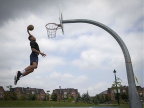 Sun Youth basketball player Wilguens Exacte Jr. practises at Bois-Franc Park in St-Laurent on July 8, 2020.