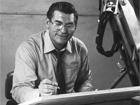 Duncan Macpherson at his drawing board in his heyday at the Toronto Star in the 1970s. The apparatus attached to the drawing board was invented by Macpherson to create possible animations of his cartoons on television.