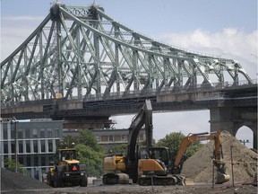 Construction equipment sits idle near the Jacques-Cartier bridge on Friday July 17, 2020 at the start of the Quebec construction holiday. (Pierre Obendrauf / MONTREAL GAZETTE)