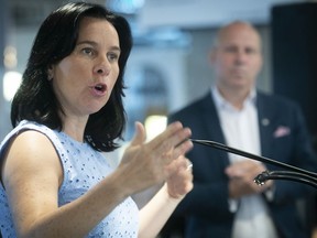 “It was very important for the city of Montreal to send a clear message, to support our partners and say: ‘We believe in downtown, we love it and we’re going to help it,’ ” Mayor Valérie Plante said Tuesday. Chamber of Commerce of Metropolitan Montreal CEO Michel Leblanc is in the background.