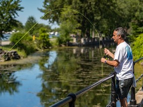 "This year about 50 per cent of my customers I’ve never seen before, which is nice,” says Ron Touaty, owner of Lachine Bait and Tackle, shown here casting his fly rod. "It’s COVID related, obviously.”
