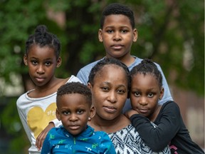 Masabatha Sylvia Kakandjika and her four children (clockwise from top): Marc-Andy, 11; Melody, 7; Marc-Rene, 3; and Jacqueline, 10. They say they are traumatized and afraid to leave their home in Longueuil since Kakandjika had an altercation with a security guard at the Place Desormeaux mall on June 10.