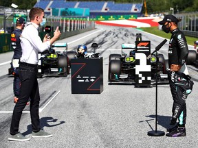 Second-place qualifier Lewis Hamilton of Great Britain and Mercedes GP talks to the media in during qualifying for the Formula One Grand Prix of Austria at Red Bull Ring on July 04, 2020 in Spielberg, Austria.