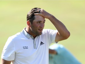 Jon Rahm of Spain reacts after finishing on the 18th green during the third round of The Memorial Tournament on July 18, 2020 at Muirfield Village Golf Club in Dublin, Ohio.