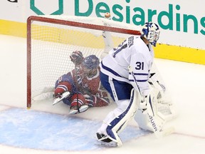 Canadiens' Paul Byron ended up in the Toronto net behind Leafs goalie Frederik Andersen after being hooked during the second period Tuesday night in Toronto.