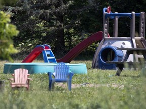 A children's playground sits idle at a home near the scene of a tractor accident that saw three young children die in Notre-Dame-de-Stanbridge.