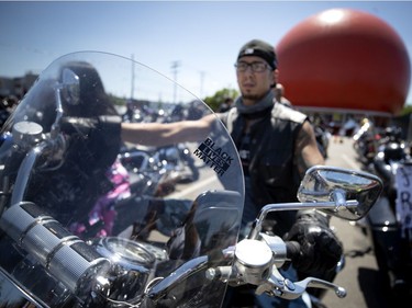 Arthur Rolland joins a group of motorcyclists to take part in a motorcade to voice their support for anti racism movement, in Montreal, on Saturday, July 4, 2020. (Allen McInnis / MONTREAL GAZETTE)
