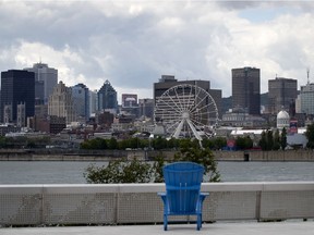 The Adirondack chairs sit empty as the lookout point on ile Sainte-Helene is void of tourist or pope using the park in Montreal, on Monday, July 20, 2020. (Allen McInnis / MONTREAL GAZETTE)