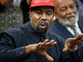 FILE: Rapper Kanye West speaks during a meeting with U.S. President Donald Trump in the Oval office of the White House on October 11, 2018 in Washington, DC.