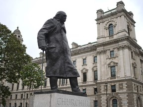 The uncovered statue of former British prime minister Winston Churchill in Parliament Square, central London is shown on June 18, 2020 after protective boxing was removed that had been placed around the statute after it was targeted by anti-racism protesters. Quoting Shakespeare, Paul Jones says, "The evil that men do lives after them, the good is oft interred with their bones." For Jones, Churchill will always be remembered as a wartime hero.