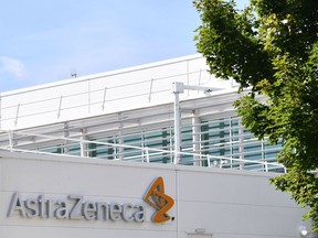 A sign is pictured outside the AstraZeneca factory in Liverpool north west England on July 20, 2020. - Britain's government has already said it would purchase 100 million doses of a vaccine currently being trialed by Oxford University in partnership with AstraZeneca. (Photo by Paul ELLIS / AFP)