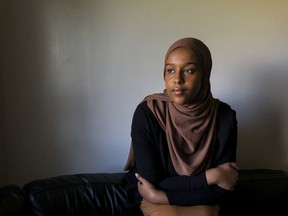 Asmaa Ali is photographed at home in Edmonton, Friday, July 17, 2020. She is the co-creator, along with her friend Habon Ali, of a Canada-wide comprehensive list of resources for survivors of sexual assault. This image was directed remotely while Aisha Ali operated the camera, because of COVID-19 related restrictions.