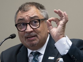 Quebec's Public Health Director Horacio Arruda responds to a question during a news conference in Gatineau, Que., Friday, July 10, 2020.