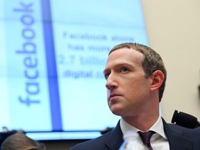 Facebook Chairman and CEO Mark Zuckerberg testifies at a House Financial Services Committee hearing in Washington, U.S., October 23, 2019. REUTERS/Erin Scott     TPX IMAGES OF THE DAY - RC1FB4B41120/File Photo