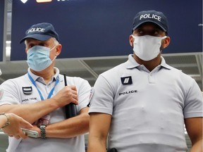 French police officers at the entrance at Paris-Orly Airport in June 2020.