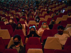 Movie fans gather to bid farewell to the last stand-alone movie theatre "La Scala" amid the spread of the coronavirus disease (COVID-19) in Bangkok, Thailand July 4, 2020.