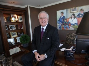 Former prime minister Brian Mulroney is seen in his Montreal offices in 2014. "Today, he does not appear ready to hang up his skates," Paul Deegan writes.