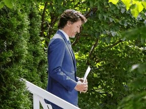 Prime Minister Justin Trudeau arrives to a news conference at Rideau Cottage in Ottawa on July 13, 2020.