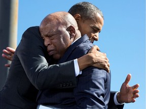 Barack Obama hugs John Lewis during an event to commemorate the 50th anniversary of Bloody Sunday and the Selma to Montgomery civil rights marches, at the Edmund Pettus Bridge in Selma, Ala., in 2015.