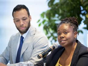 Tiffany Callender of Montreal en Action speaks during a city consultation on systemic racism in Montreal on May 29, 2019. Balarama Holness, left, is also seen.