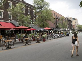 Terrasses spread onto Bernard Ave. in Outremont on Wednesday July 8, 2020. While, it's unfair to shame people for taking part in permitted activities, "I cannot help but wonder what impact widespread participation in non-essential leisure activities will have on school reopenings and attendance," writes pediatrician Silvana Barone.