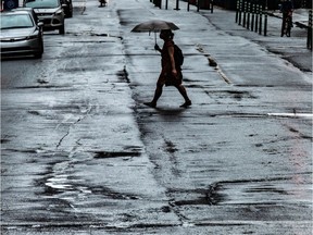 Montrealers took to the streets with umbrellas on Tuesday as a rainfall warning was in effect as a result of Hurricane Isaias making its way up the east coast of the United States.