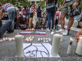 A candlelight vigil was held at Dorchester Square Wednesday in support of the Lebanese community dealing with the massive explosion in Beirut that killed at least 135 people and injured thousands on Tuesday.