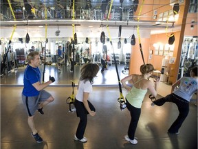 David Snively leads a session at his fitness club in 2008. Snively says his business is down 80 per cent since reopening — “people are afraid to come inside” — but he has found a new online community that has encouraged him to share his expertise from in front of a camera instead of in front of a class.