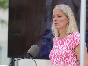 Federal Minister of Infrastructure and Communities Catherine McKenna speaks in Springer Market Square during the announcement of $47-million in funding from the federal, provincial and municipal government for sustainable infrastructure and active transportation in Kingston, Ont., on Monday, August 10, 2020.