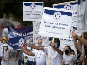 Boat owners protest against the city's plan to close the Lachine Marina in Montreal on Monday, Aug. 24, 2020.