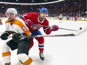 Canadiens Phillip Danault pressures Flyers' Ivan Provorov during game last year. "My role shouldn't change in Montreal," Danault said. "I have demonstrated that I am capable of playing both defensively and offensively."