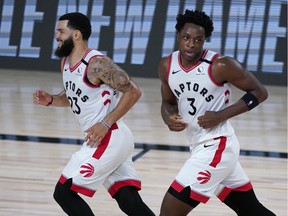 Fred VanVleet #23 and OG Anunoby #3 of the Toronto Raptors react after defeating the Los Angeles Lakers in an NBA basketball game at The Arena in the ESPN Wide World Of Sports Complex on August 1, 2020 in Lake Buena Vista, Florida.