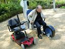 Ronald Woolf swaps his mobility scooter for an exercise machine in London's Hyde Park in 2010. Seniors themselves often have traditional views on what type of exercise is appropriate for older adults, Jill Barker writes.