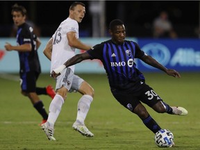 Impact's Romell Quioto passes the ball against D.C. United during group stage match of the MLS Is Back tournament last month.