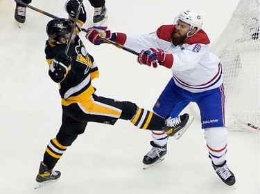 Shea Weber #6 of the Montreal Canadiens shoves Jason Zucker #16 of the Pittsburgh Penguins in the third period during Game One of the Eastern Conference Qualification Round prior to the 2020 NHL Stanley Cup Playoffs at Scotiabank Arena on August 01, 2020 in Toronto, Ontario.
