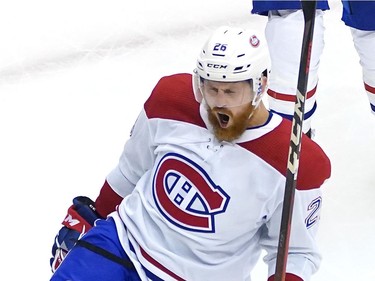 Jeff Petry #26 of the Montreal Canadiens celebrates his game winning goal in the overtime period against the Pittsburgh Penguins during Game One of the Eastern Conference Qualification Round prior to the 2020 NHL Stanley Cup Playoffs at Scotiabank Arena on August 01, 2020 in Toronto, Ontario.