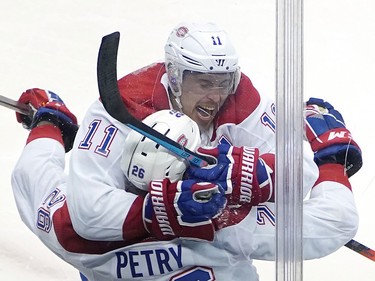 Jeff Petry #26 of the Montreal Canadiens celebrates his game winning goal with teammate Brendan Gallagher #11 in the overtime period against the Pittsburgh Penguins during Game One of the Eastern Conference Qualification Round prior to the 2020 NHL Stanley Cup Playoffs at Scotiabank Arena on August 01, 2020 in Toronto, Ontario.