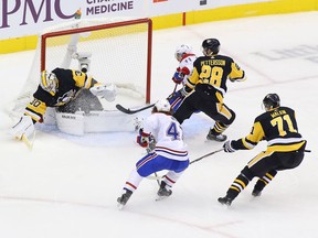 Matt Murray #30 of the Pittsburgh Penguins makes a save against Brendan Gallagher #11 of the Montreal Canadiens in Game Two of the Eastern Conference Qualification Round prior to the 2020 NHL Stanley Cup Playoffs at Scotiabank Arena on August 03, 2020 in Toronto, Ontario.