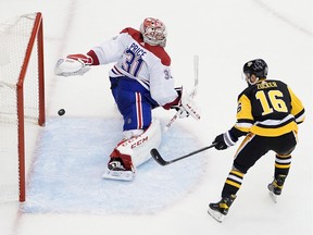 Jason Zucker of the Pittsburgh Penguins scores on Canadiens' Carey Price during third period in Game 2 of the Eastern Conference Qualification Round at Scotiabank Arena on Aug, 3, 2020, in Toronto.