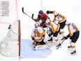 Canadiens centre Nick Suzuki scores a power-play goal past FLyers' Carter Hart during Game 6 Friday night at the Scotiabank Centre in Toronto.