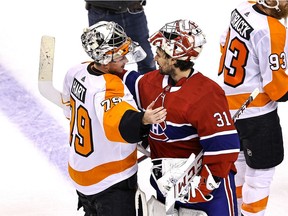 Philadelphia goalie Carter Hart and Montreal goalie Carey Price get together in handshake line after the Flyers beat the Canadiens 3-2 in Game 6 Friday night at Scotiabank Arena in Toronto to win their best-of-seven first round NHL playoff series 4-2.