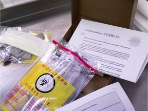A base test kit is shown during a media tour at a COVID-19 testing centre in the old Hotel Dieu Hospital in Montreal, on Tuesday, March 10, 2020.