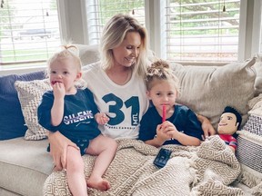 Angela Price, who is married to Canadiens goalie Carey Price, gets ready to cheer him on along with their daughters Liv, 4, and Millie, 1, from her parents' home in Kennewick, Wash., during 2020 NHL playoffs.
