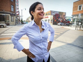 Dominique Anglade stops to greet a reporter before heading into a coffee shop across from her campaign office on Notre Dame St. in her riding in the Saint-Henri district in Montreal on August 24, 2018. "As she prepares her party for the next election, Anglade will be reaching out to a new generation that, like her, is open to the world," Tom Mulcair writes.