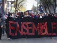 Anti-fascist protesters march toward an address associated with a person who used the pseudonym Zeiger when communicating with neo-Nazis on white supremacist websites in 2018.